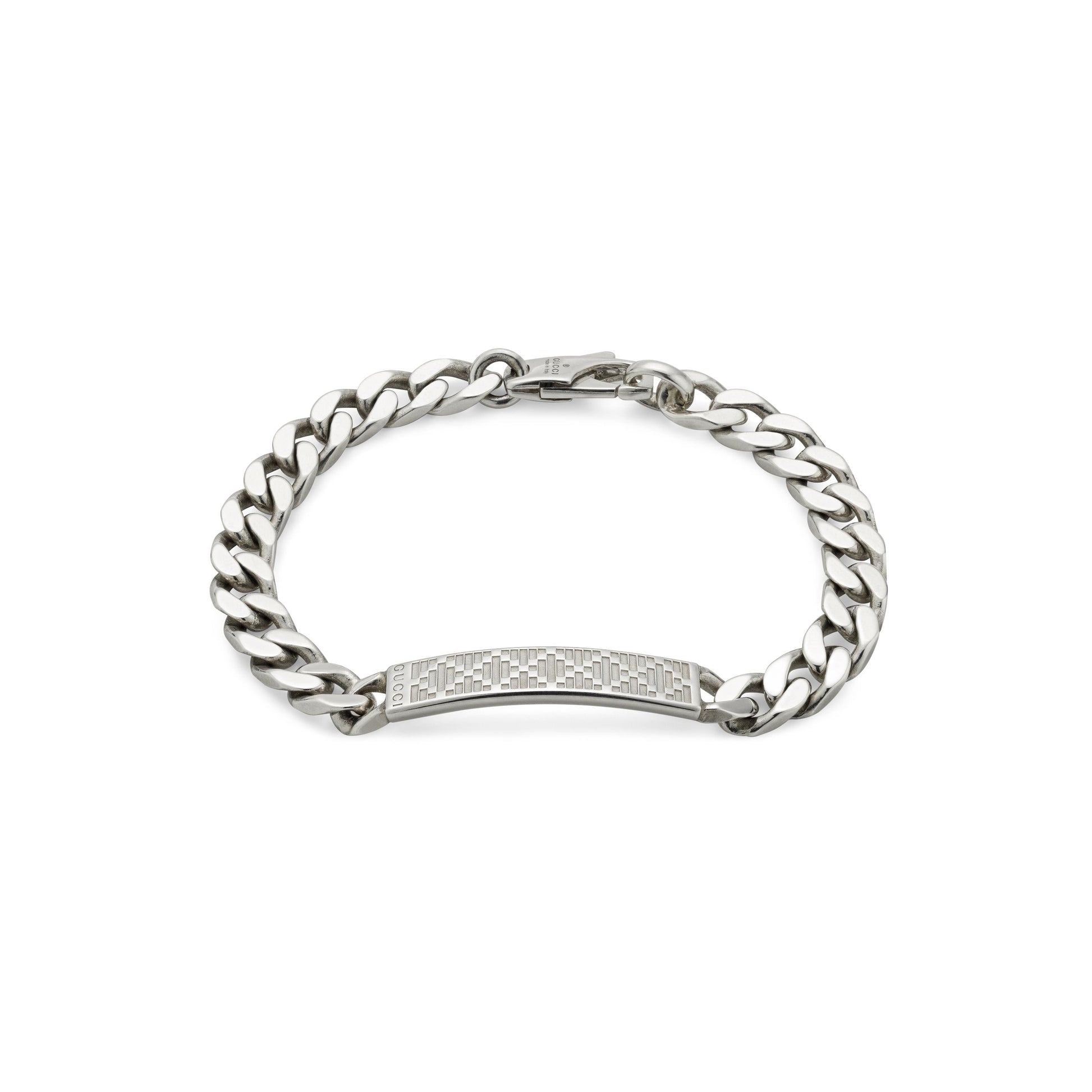 The Gucci Diamante Sterling Silver Chain Bracelet by GUCCI Fine Jewellery features a flat, engraved plate inspired by the Diamante pattern and a secure clasp, perfect for women’s jewelry collections.