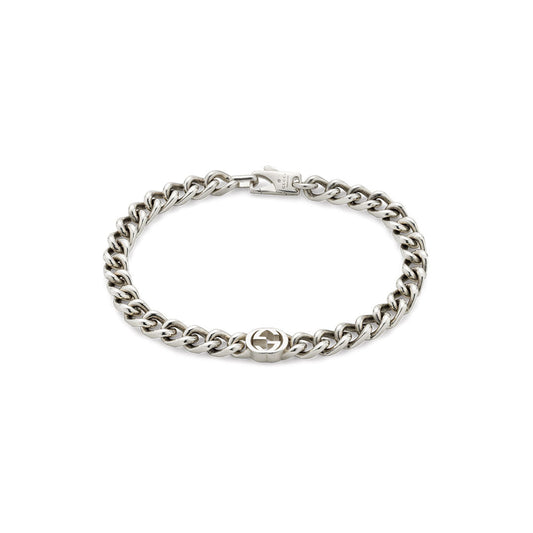 The GUCCI Fine Jewellery Interlocking G Sterling Silver Bracelet features a lobster clasp and a central Interlocking G charm, shown on a white background.