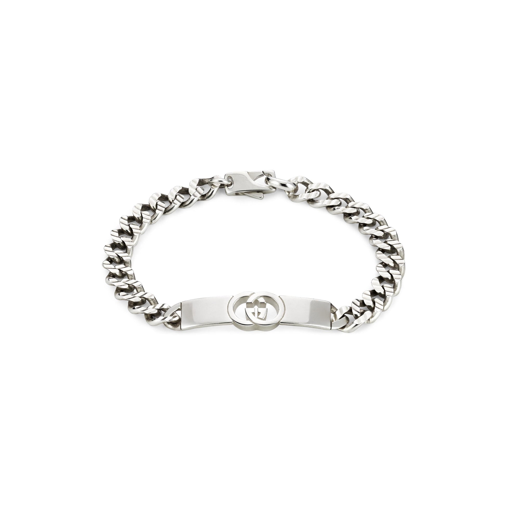 The GUCCI Fine Jewellery Interlocking Sterling Silver Chain Bracelet features a flat engraved plate with the iconic Interlocking G logo, set on a chunky 925 sterling silver curb-link chain for a bold, stylish statement.