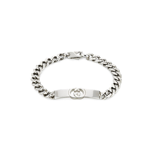 The GUCCI Fine Jewellery Interlocking Sterling Silver Chain Bracelet features a flat engraved plate with the iconic Interlocking G logo, set on a chunky 925 sterling silver curb-link chain for a bold, stylish statement.
