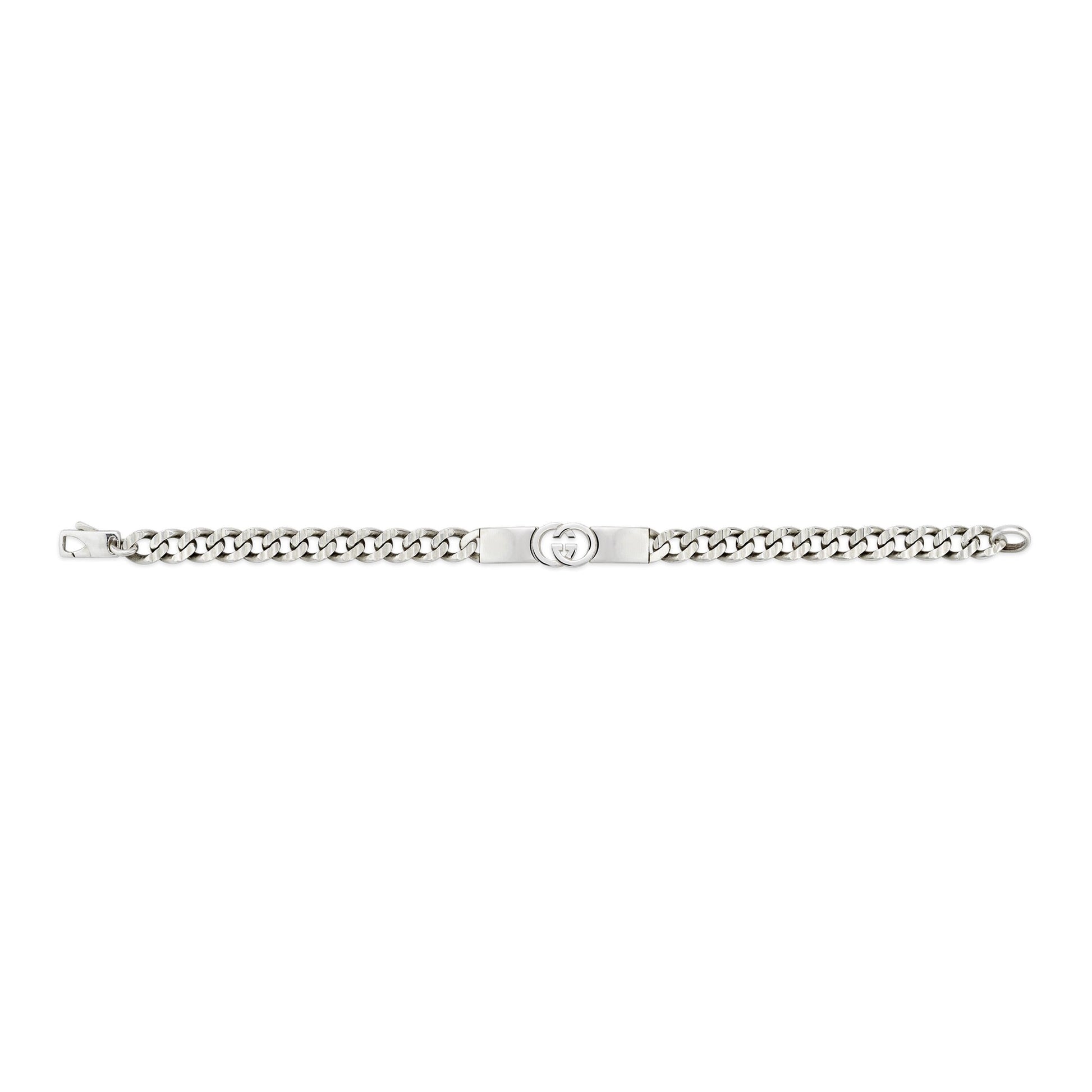 The Gucci Interlocking Sterling Silver Chain Bracelet by GUCCI Fine Jewellery features chunky curb links in 925 silver and a central plate with the iconic Interlocking G logo.