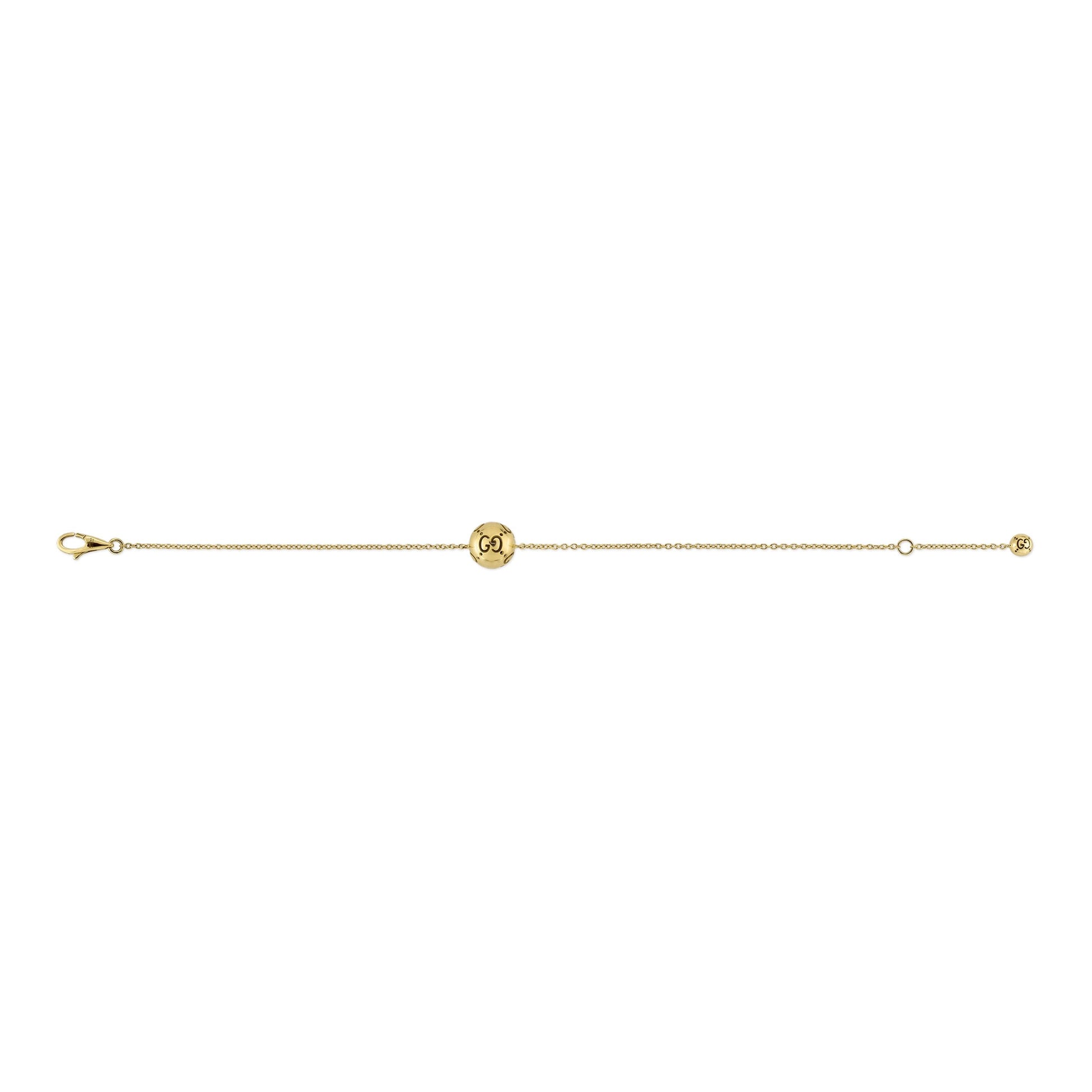 The Gucci Icon Boule 18K Yellow Gold Chain Bracelet by GUCCI Fine Jewellery features a delicate chain with a small interlocking double G logo charm at the center and a tiny circular charm near the clasp, available in open sizes.