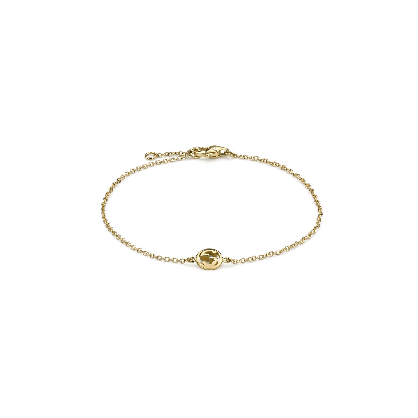 The Gucci Interlocking 18K Yellow Gold Chain Bracelet by GUCCI Fine Jewellery features a fine chain, a small circular Interlocking G charm, and a secure lobster clasp.