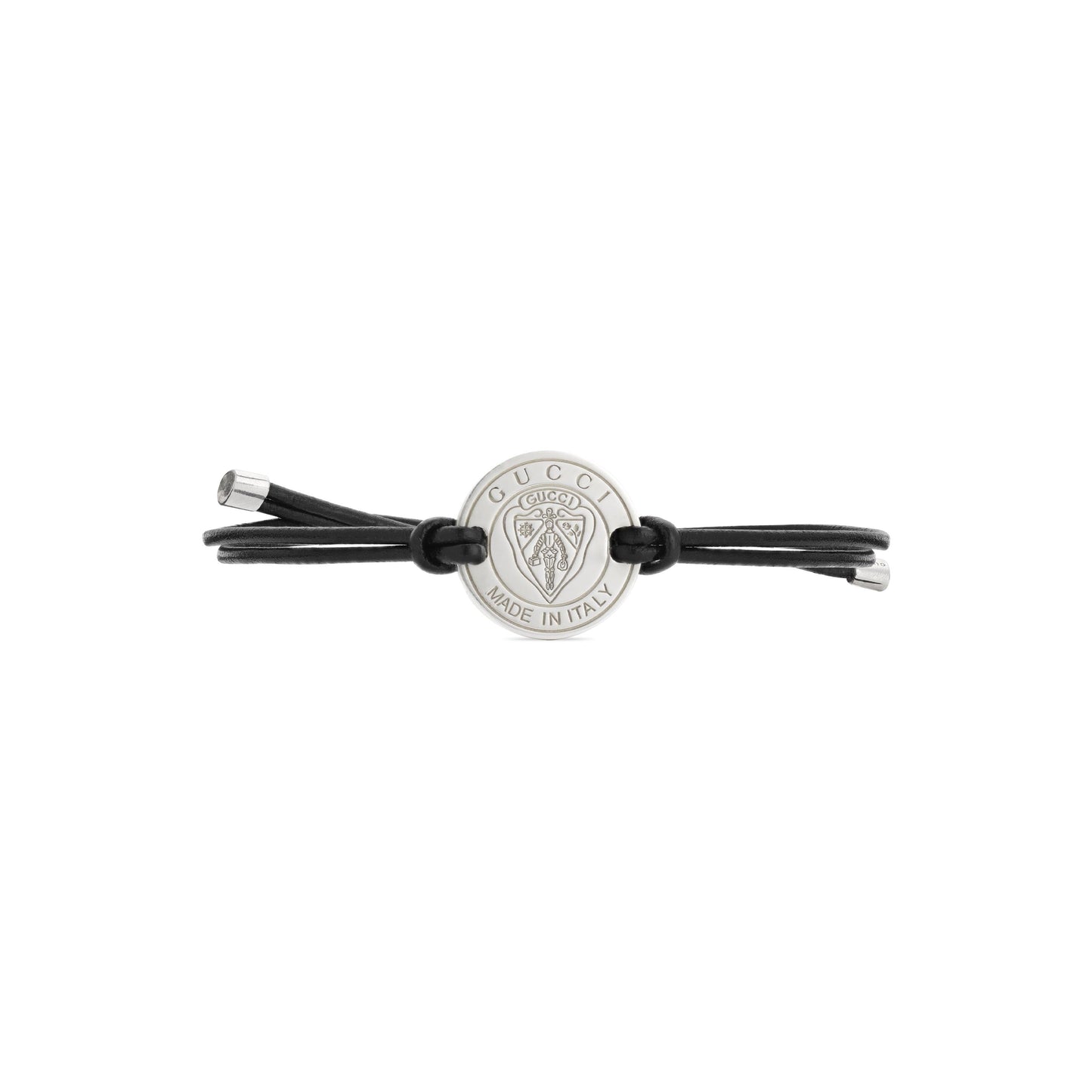 The GUCCI Fine Jewellery Crest Leather Cord with Sterling Silver Bracelet features a black leather cord, a round silver medallion engraved with the Gucci logo and "Made in Italy," plus two elegant sterling silver end caps.