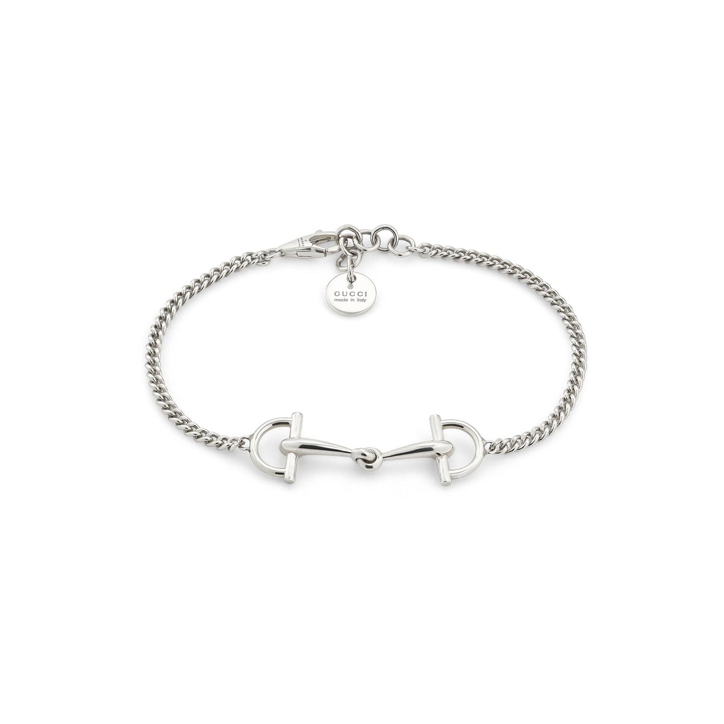 The Gucci Staffa Sterling Silver Station Bracelet by GUCCI Fine Jewellery features a horsebit design and a round Gucci tag near the clasp, all beautifully displayed on a white background.