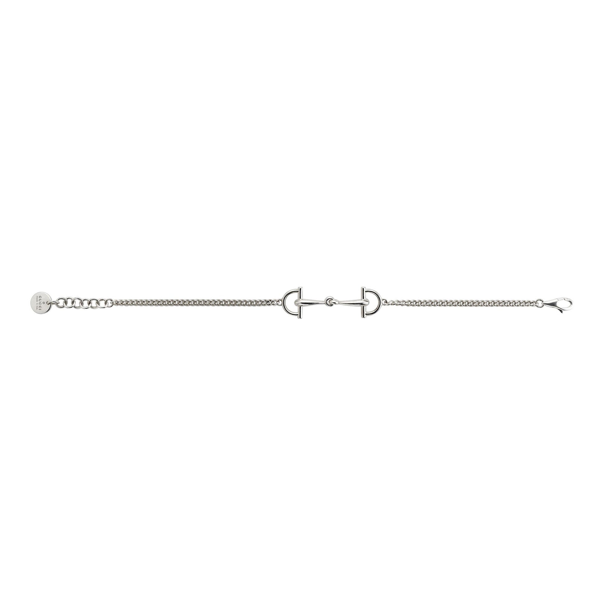 The Gucci Staffa Sterling Silver Station Bracelet by GUCCI Fine Jewellery features a delicate chain and horse bit motif, adjustable links, and a lobster clasp. Expertly crafted in Italy and inspired by iconic Gucci designs.
