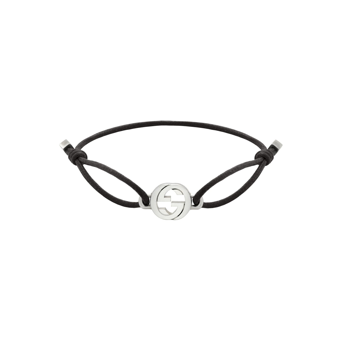 The Gucci Interlocking Cotton Cord with Sterling Silver Bracelet by GUCCI Fine Jewellery features a minimalist black cord, an interlocking G sterling silver emblem, adjustable knotted closure, and elegant silver end caps.
