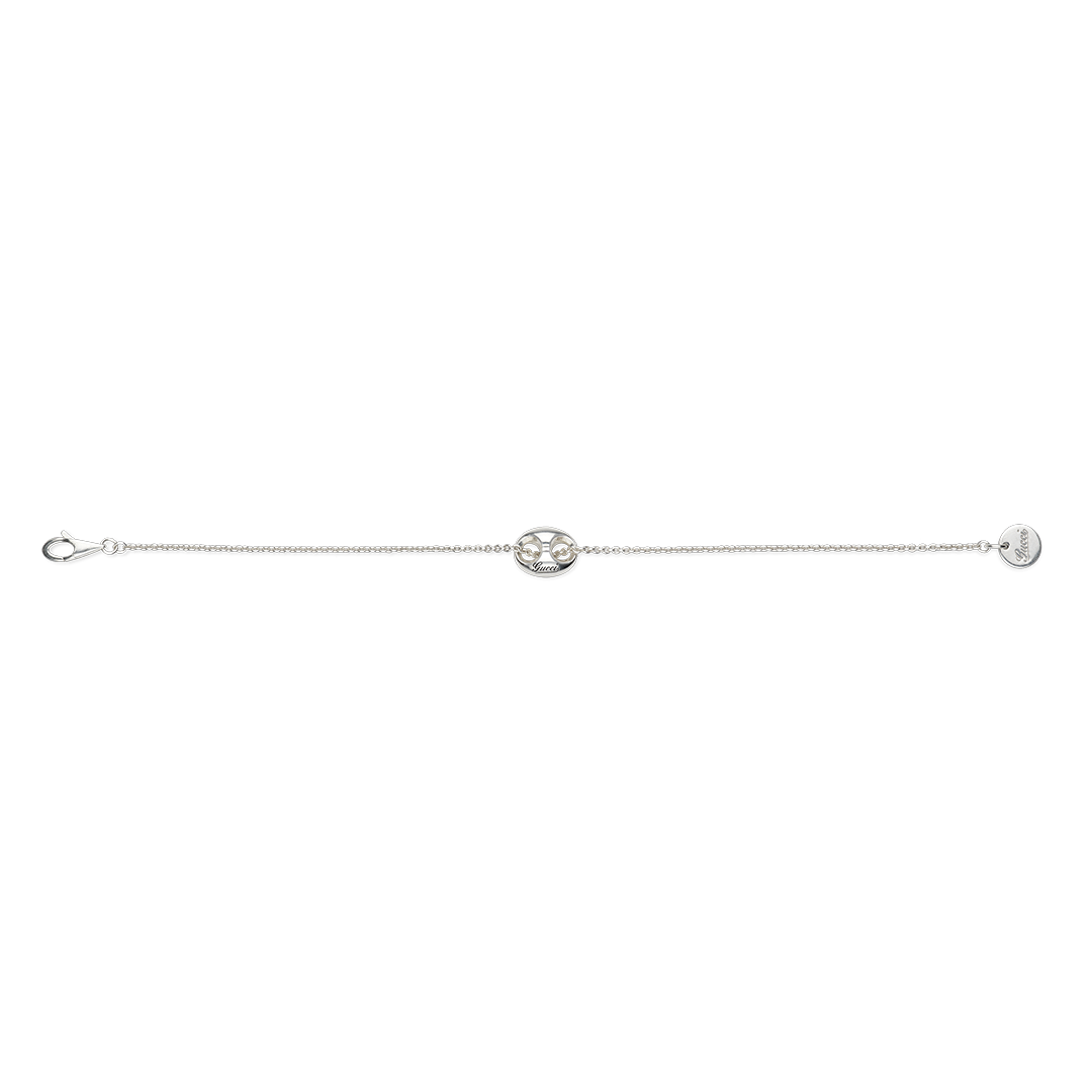 Gucci Marina Sterling Silver Chain Bracelet featuring a central anchor-shaped link and a small circular charm at the clasp.