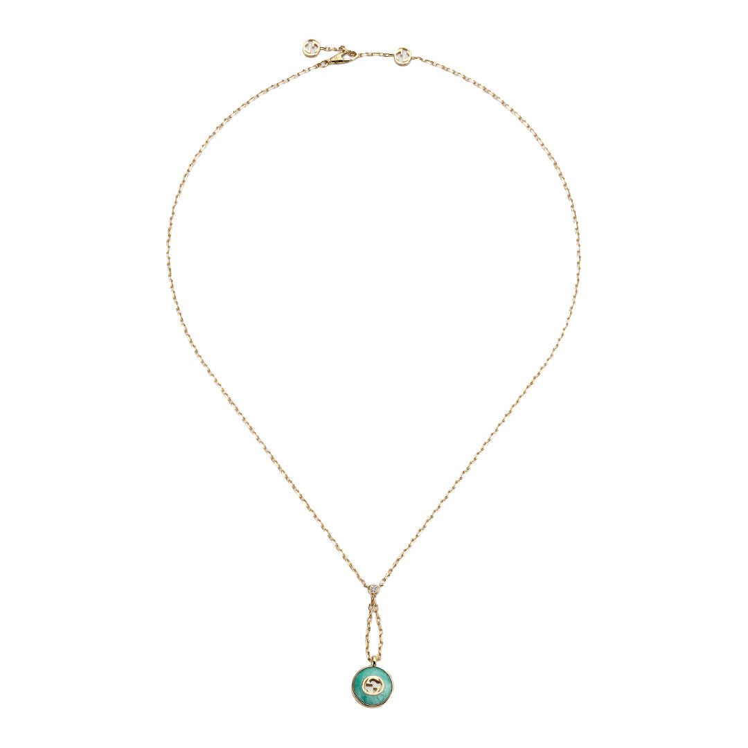 The GUCCI Fine Jewellery Interlocking 18K Yellow Gold Diamond Necklace features an amazonite stone pendant with a small central design, displayed in a circular shape on a white background.