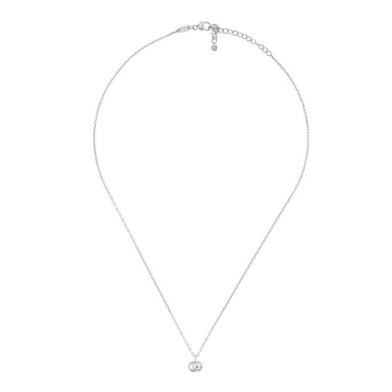The Gucci GG Running 18K White Gold Necklace Pendant by GUCCI Fine Jewellery features a slender chain with an adjustable clasp. Elegantly simple, it showcases a small Double G pendant crafted in 18K white gold at its center.