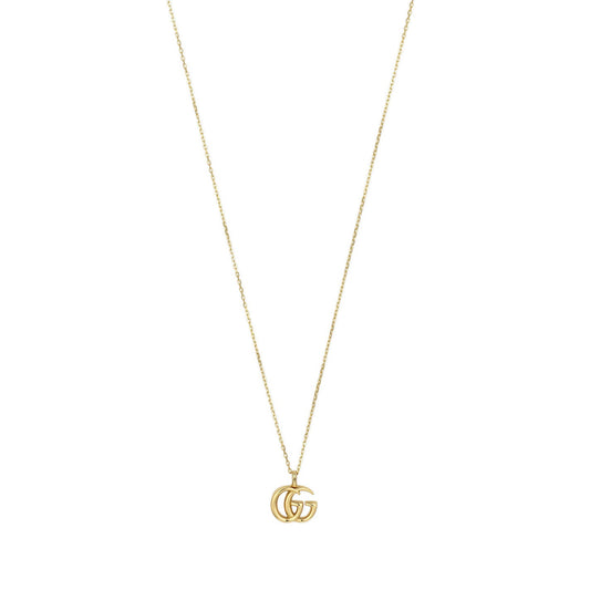 Introducing the Gucci GG Running 18K Yellow Gold Necklace Pendant from GUCCI Fine Jewellery. This sophisticated piece highlights an elegant gold chain adorned with a central interlocking "G" pendant, embodying the minimalist style of the GG Running collection. Certified by the Responsible Jewellery Council, it upholds high standards of craftsmanship and sophistication.