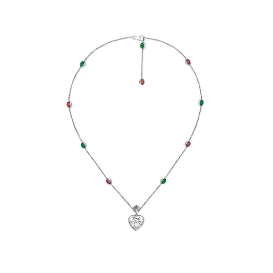 This exquisite Gucci Blind For Love sterling silver necklace features alternating pink and green cubic zirconia gemstones along the chain. At its center is a heart-shaped pendant engraved with "Bella, I love you," capturing the elegance of GUCCI Fine Jewellery motifs.