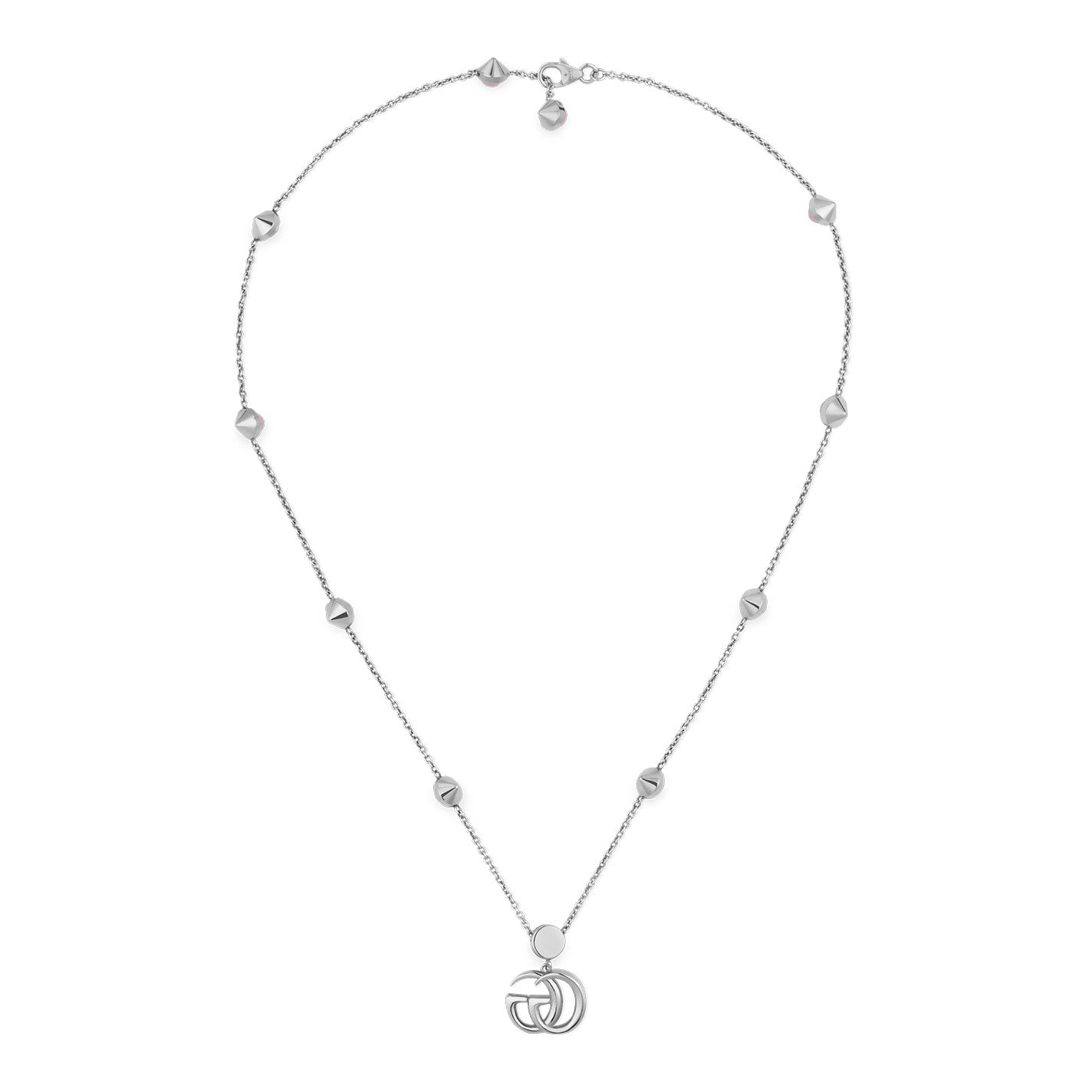 A Gucci Fine Jewellery creation, this sterling silver necklace showcases a delicate chain adorned with small round accents and features an interlocking Double G pendant crafted with pink mother of pearl.