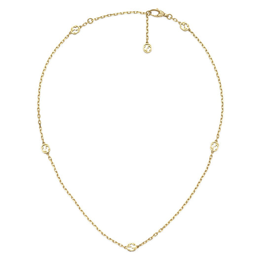 The Gucci Interlocking G 18K Yellow Gold Station Necklace from GUCCI Fine Jewellery features an elegant chain with small interlocking G logo charms evenly spaced, complete with an adjustable clasp.