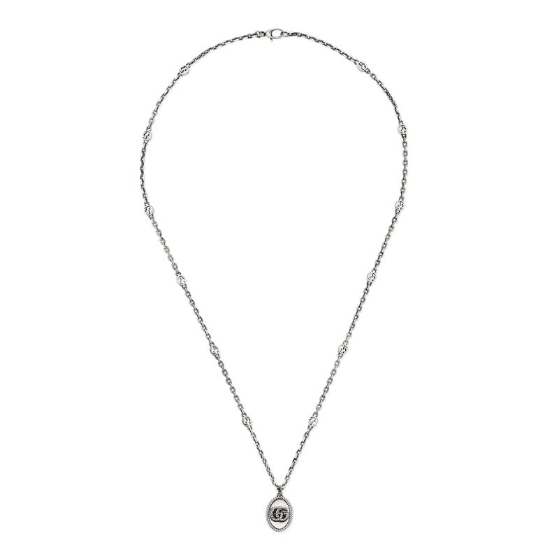 A Gucci Double G Sterling Silver Necklace Pendant from the GG Marmont Collection, featuring a delicate chain with small decorative links and a round pendant at the center, by GUCCI Fine Jewellery.