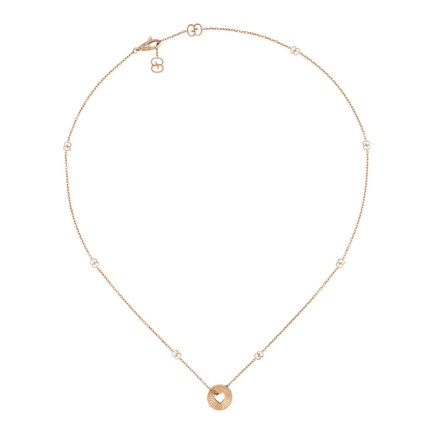 The Gucci Icon Heart 18K Rose Gold Necklace Pendant from GUCCI Fine Jewellery showcases a delicate chain adorned with small circular accents and features a striking circular pendant with a heart-shaped cutout at its center.