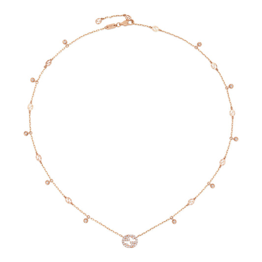 Indulge in the elegance of the Gucci Interlocking G 18K Rose Gold Necklace, featuring subtle, evenly spaced round diamond accents and a prominent circular diamond pendant at its center, epitomizing the sophistication of GUCCI Fine Jewellery.