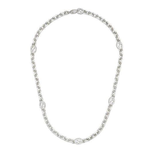 The Gucci Interlocking G Sterling Silver Chain Station Necklace from GUCCI Fine Jewellery is crafted from 925 sterling silver and showcases interlocking G motifs evenly spaced along the chain, highlighted against a white background.