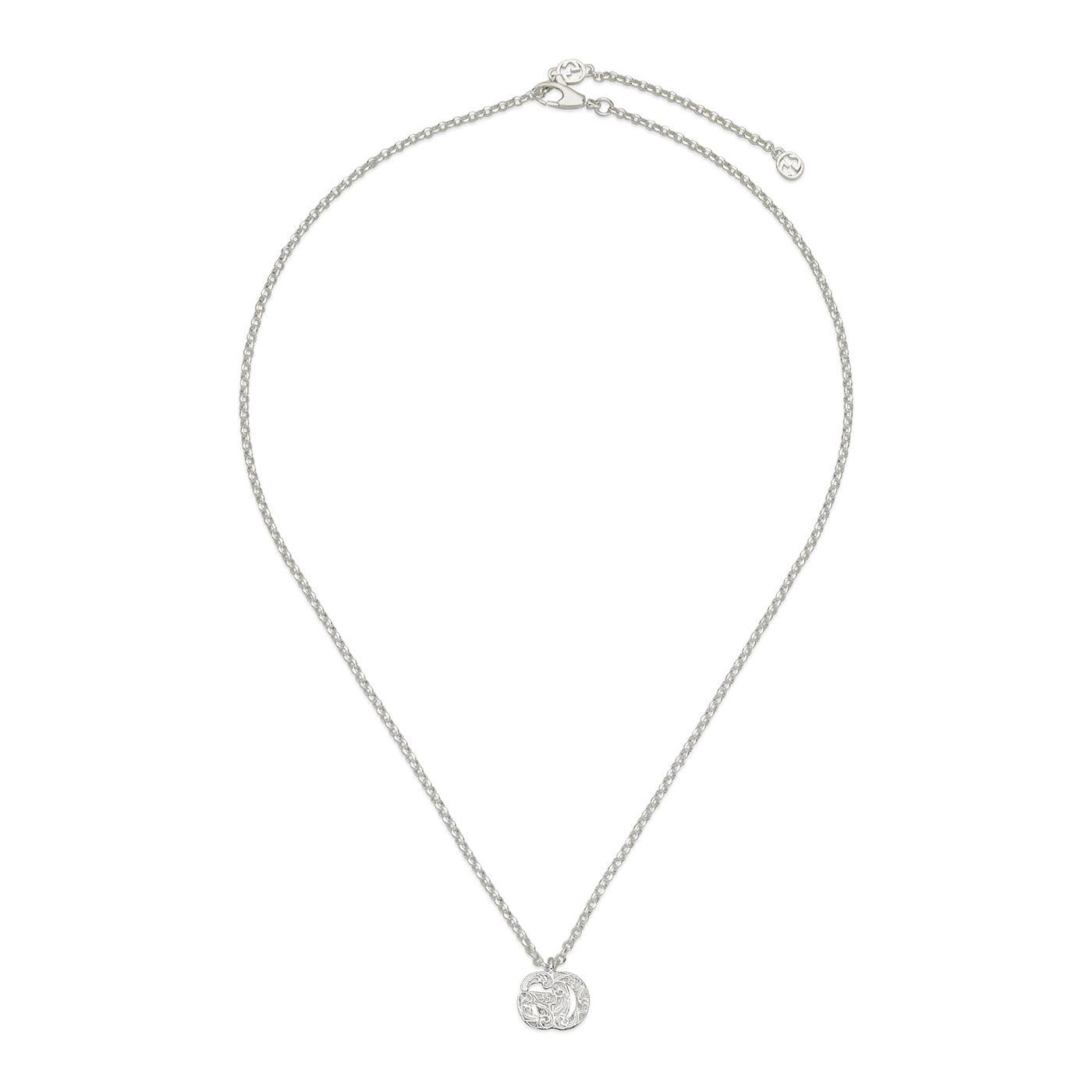 Introducing the Gucci GG Marmont Sterling Silver Necklace Pendant by GUCCI Fine Jewellery, featuring a round, textured pendant with an elegant leaf design. The adjustable chain includes a subtle charm at the end, adding a refined touch to its minimalist style.