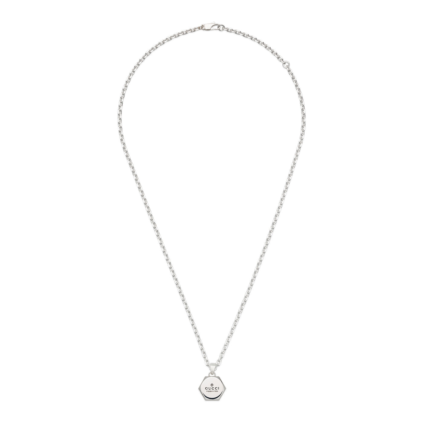 The Gucci Trademark Sterling Silver Necklace by GUCCI Fine Jewellery features a hexagonal pendant engraved with the Gucci logo. It has an adjustable chain with a simple clasp, showcasing a minimalist and elegant design.