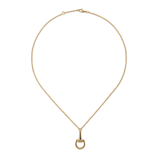 The Gucci Horsebit 18K Yellow Gold Chain Necklace by GUCCI Fine Jewellery showcases a sleek horseshoe-shaped pendant on a delicate chain, highlighted against a plain white background to emphasize its elegant simplicity.
