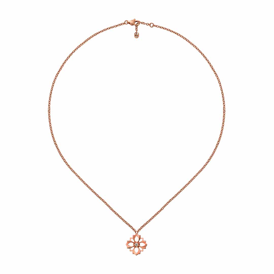 The Gucci Flora 18K Rose Gold Diamond Necklace Pendant by GUCCI Fine Jewellery is an exquisite piece featuring a flower-shaped pendant with hollow petal designs in luxurious 18k rose gold, set against a white background.