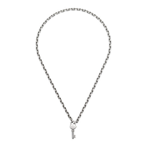 The Gucci Trademark Sterling Silver Necklace Pendant by GUCCI Fine Jewellery features a small, detailed key pendant on a classic linked chain, offering an elegant look reminiscent of the iconic Gucci style against a plain white background.