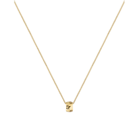 The Gucci Icon GG 18K Yellow Gold Necklace Pendant by GUCCI Fine Jewellery is an exquisite piece, showcasing a small cylindrical pendant engraved with a letter. The pendant is beautifully centered on a fine chain design, set against a plain white background, epitomizing both the ethics of the Responsible Jewelry Council and its aesthetic allure.