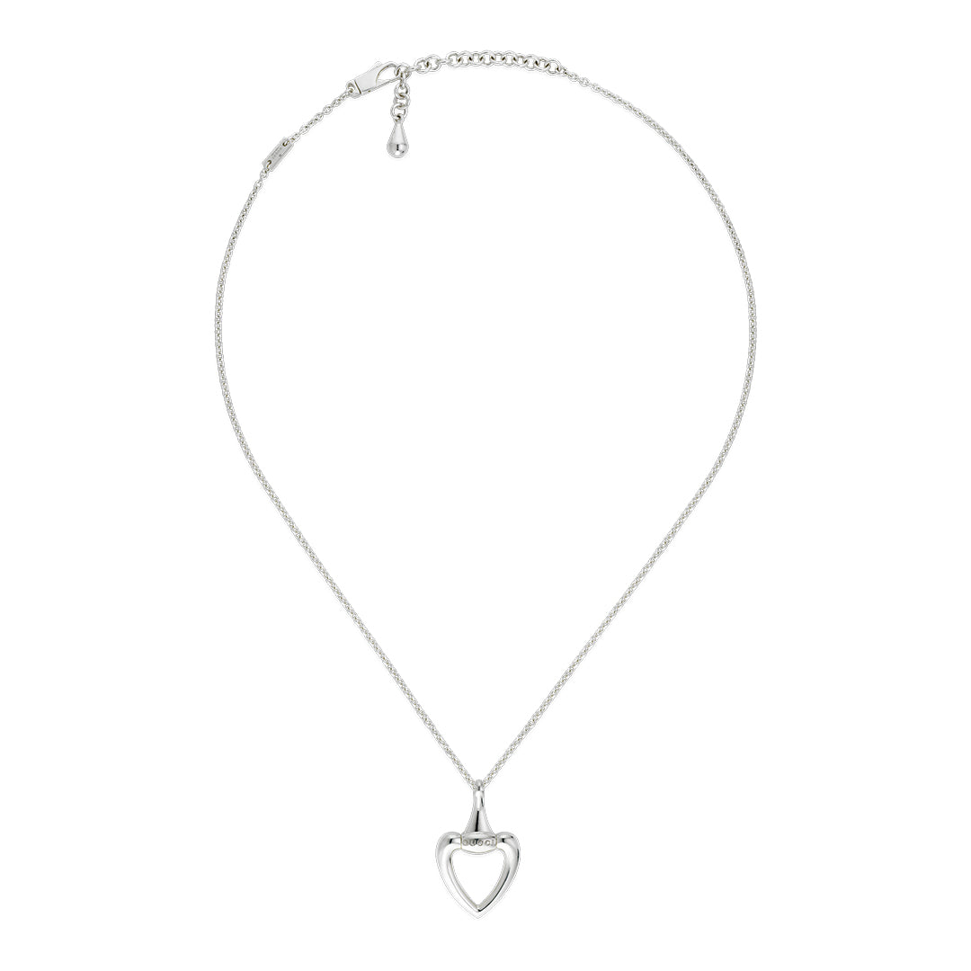 The Gucci Sterling Silver Heart Necklace Pendant by GUCCI Fine Jewellery features a delicate, open heart design on a 925 sterling silver chain. This elegant and charming piece epitomizes refined silver jewelry.