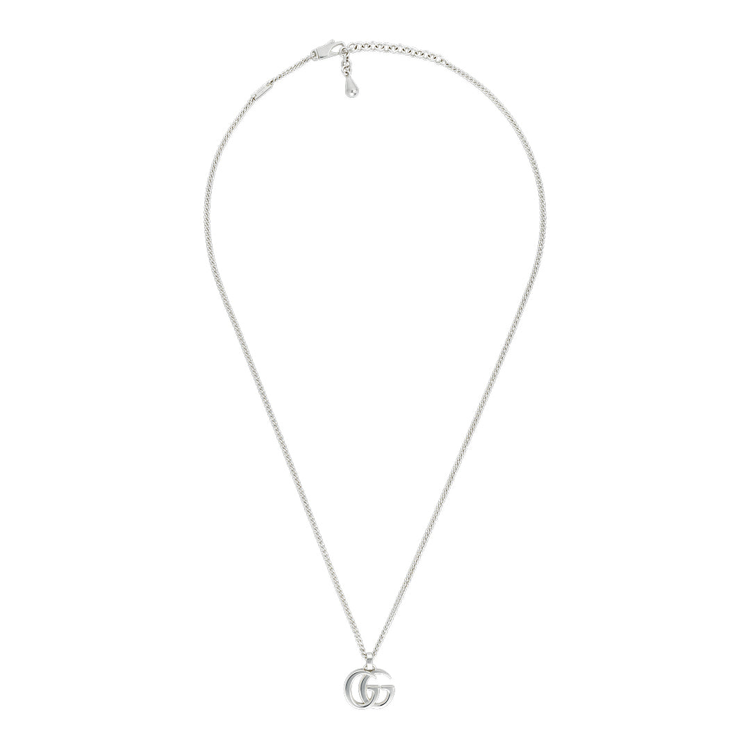 The GUCCI Fine Jewellery GG Marmont Sterling Silver Necklace Pendant features a small interlocking logo on a gourmette chain, elegantly displayed against a plain white background.