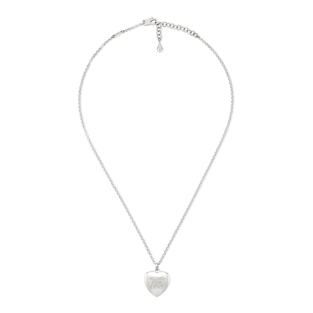 The GUCCI Fine Jewellery Blind For Love Sterling Silver Necklace Pendant features a delicate chain and a heart pendant engraved with "BLIND FOR LOVE.