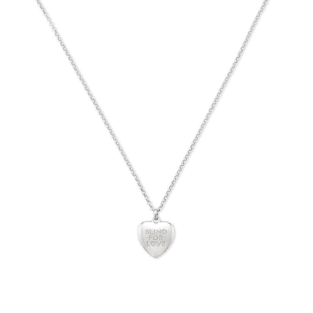 The Gucci Blind For Love Sterling Silver Necklace Pendant from GUCCI Fine Jewellery features a delicate heart design with "BLIND FOR LOVE" engraving, shown on a plain white background.