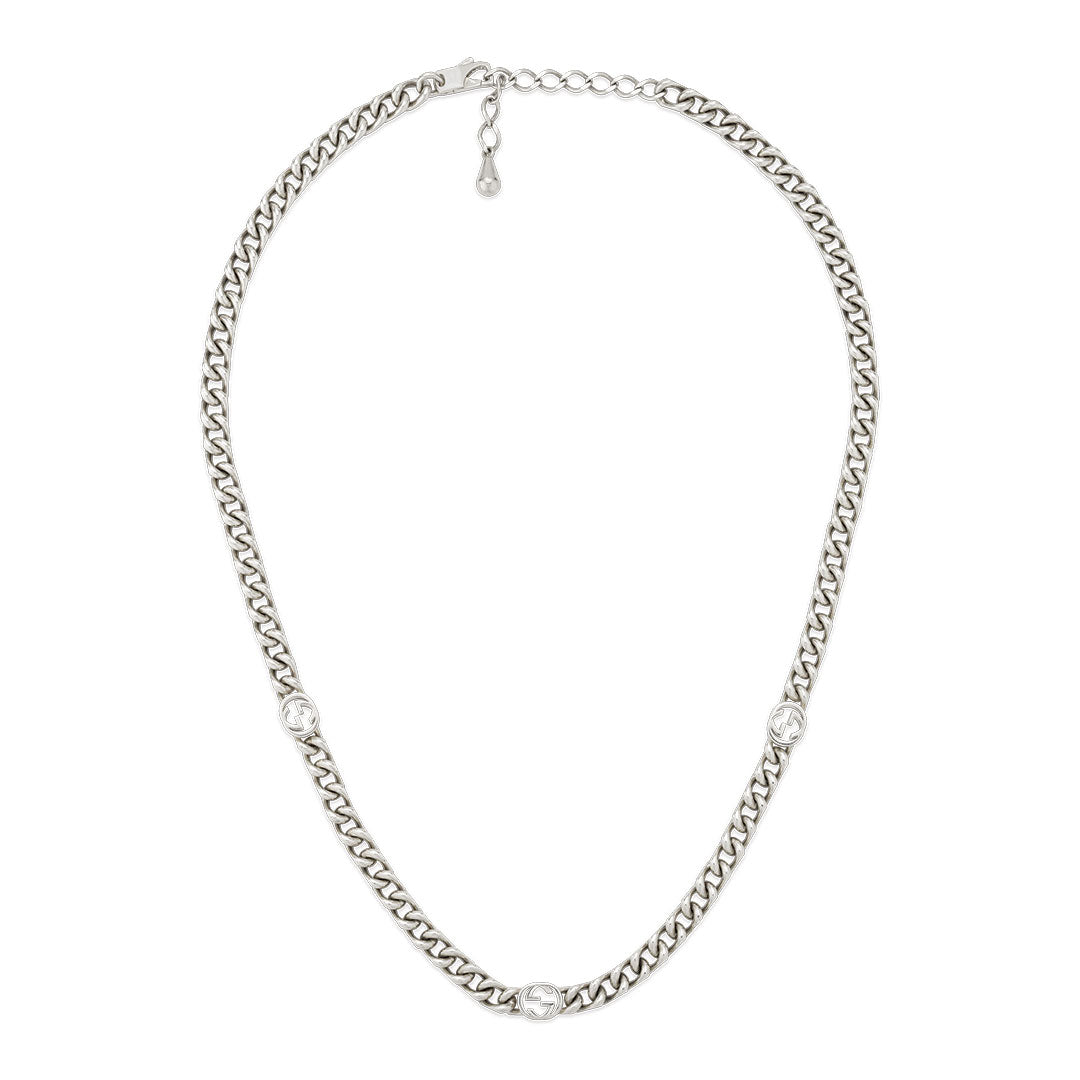 The Gucci Blind For Love Sterling Silver Chain Necklace by GUCCI Fine Jewellery features a curb link design, three round clear gemstones, an adjustable clasp, and is made in Italy.