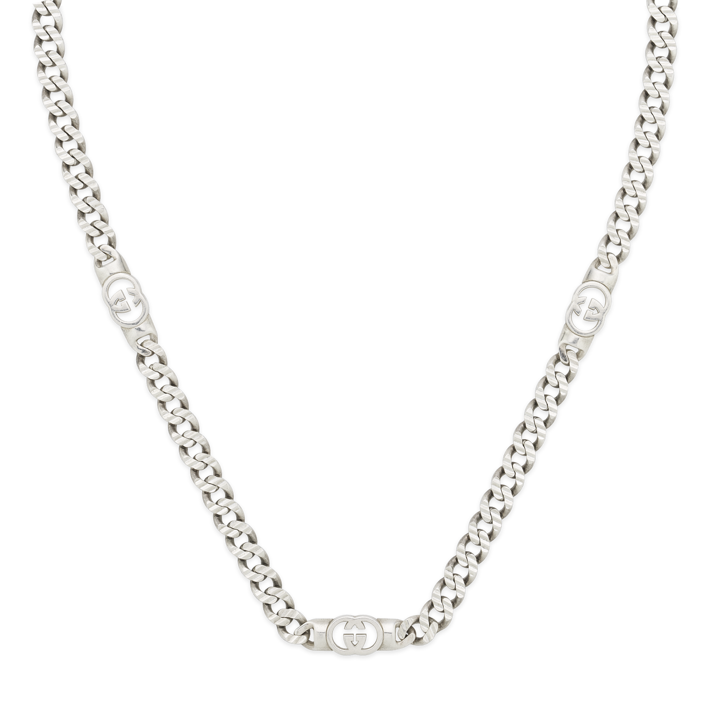 The Gucci Interlocking Sterling Silver Chain Necklace by GUCCI Fine Jewellery features interlocking links and three oval Gucci logo accents. Displayed on a white background, it pairs well with chunky hoop earrings for a bold statement.