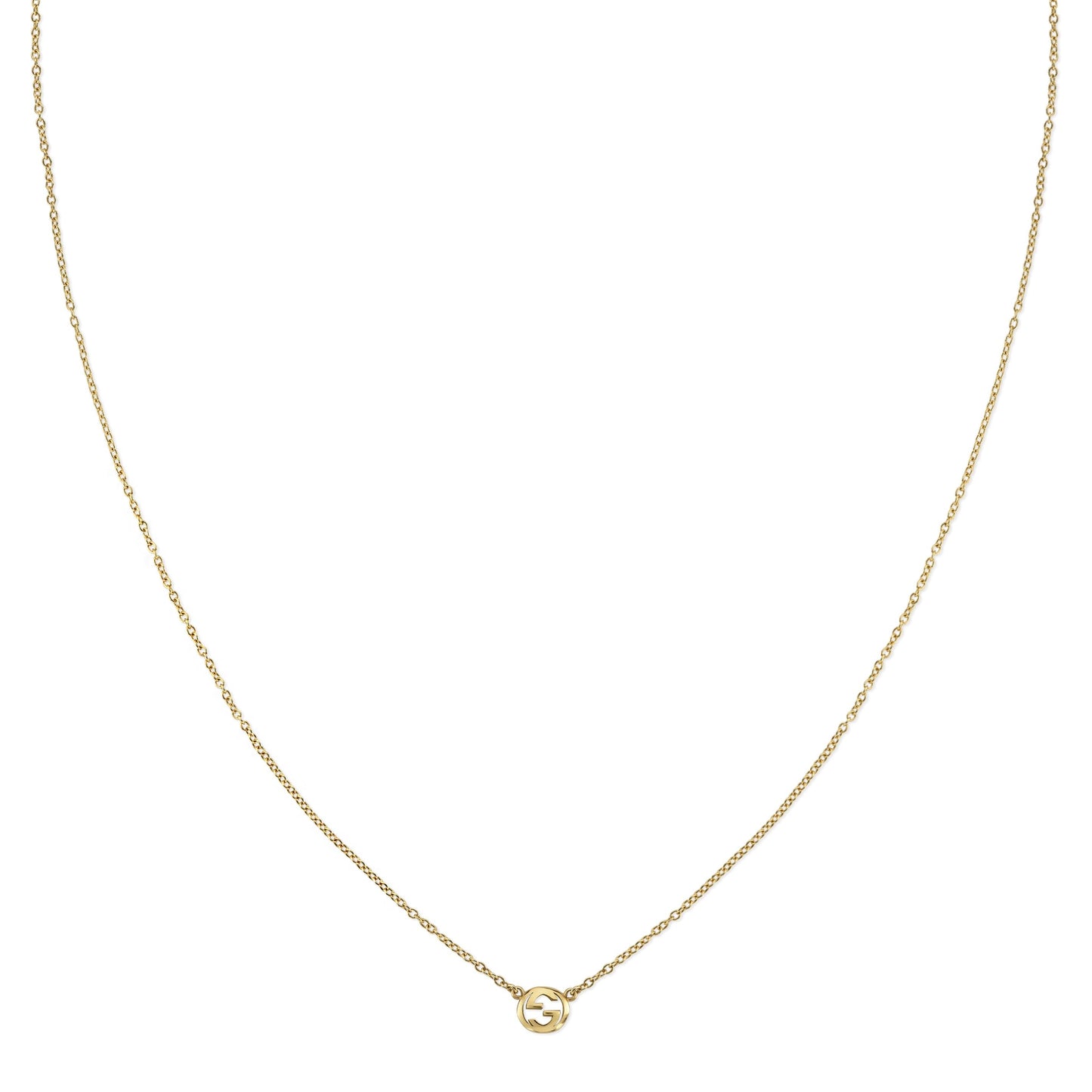 The Gucci Interlocking 18K Yellow Gold Necklace Pendant by GUCCI Fine Jewellery features a delicate yellow gold chain and a round pendant with the signature Interlocking G logo.