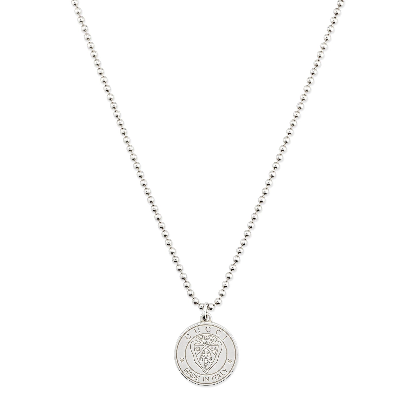 The Gucci Crest Sterling Silver Necklace Pendant by GUCCI Fine Jewellery features a round pendant engraved with a lion’s head and the signature crest, offering refined elegance on a white background.