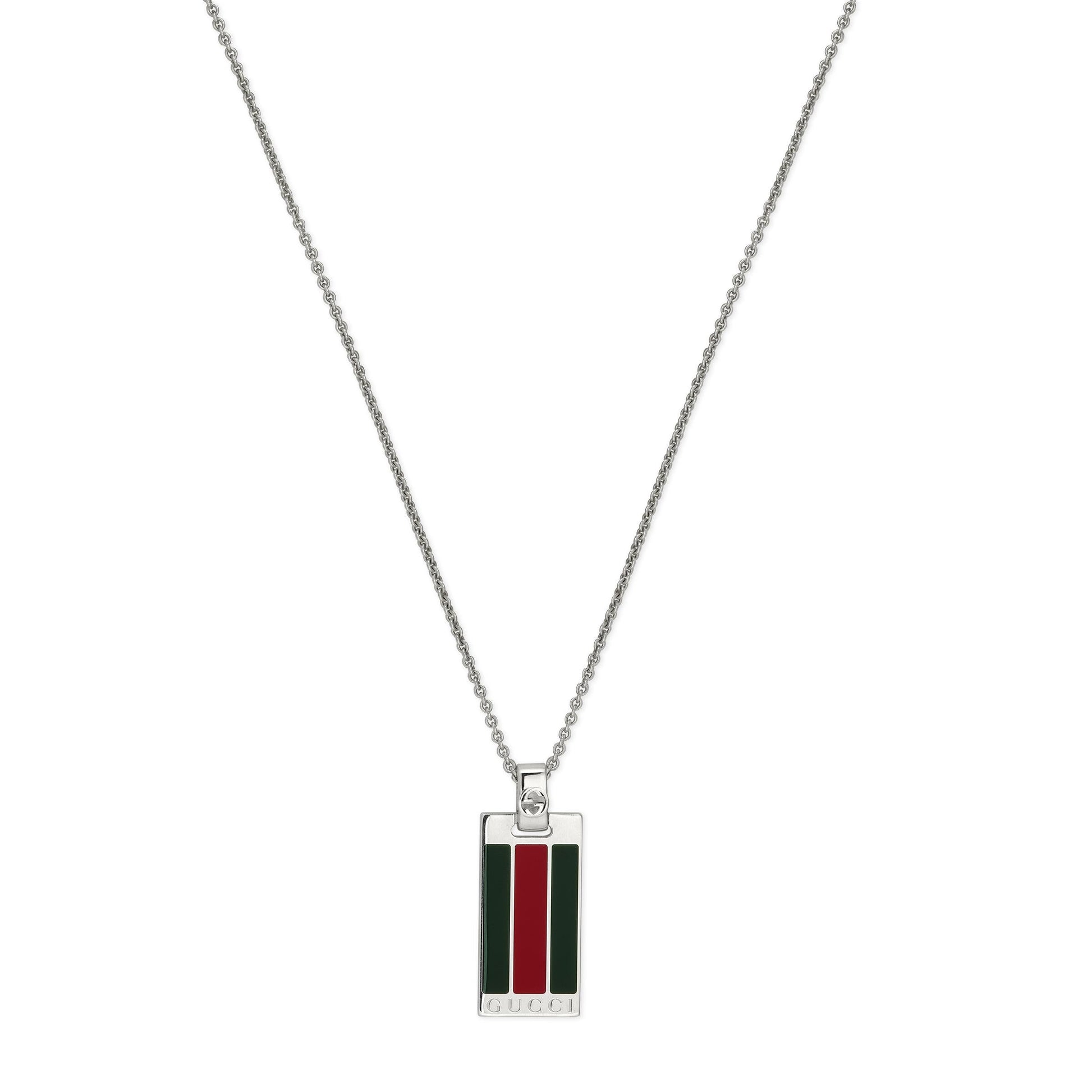 The Gucci Web Sterling Silver Tag Chain Necklace Pendant from GUCCI Fine Jewellery features a rectangular 925 sterling silver pendant with vertical green and red stripes and "GUCCI" engraved at the bottom.