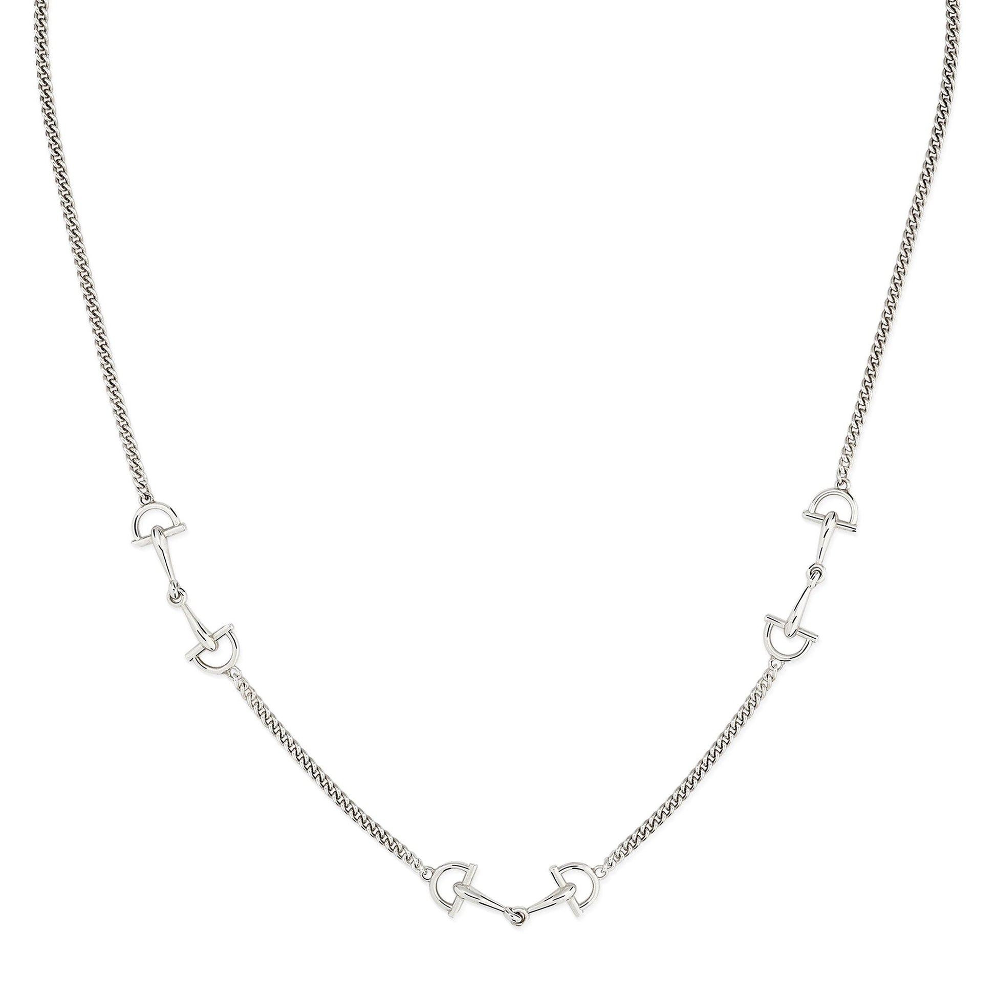 The Gucci Staffa Sterling Silver Station Necklace by GUCCI Fine Jewellery features five small, evenly spaced stirrup charms on a fine twisted chain for a subtle, minimalist elegance.