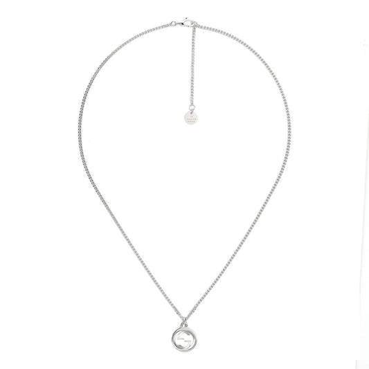 Certainly! Here is the rewritten sentence using your product data: A sterling silver necklace from GUCCI Fine Jewellery, featuring the iconic Interlocking G pendant in a round design with elegant Guilloché-style detailing. The chain includes an extender and a small circular tag near the clasp.