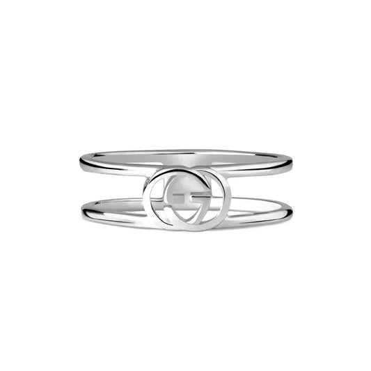A sterling silver ring featuring two elegant Interlocking G logos.