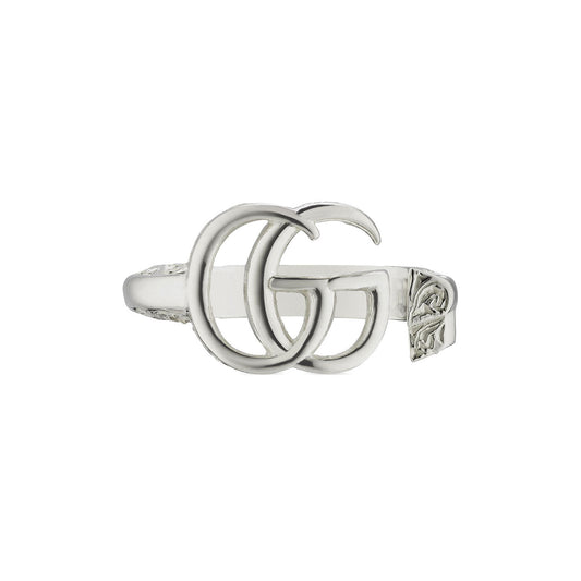 A sterling silver key ring from GUCCI Fine Jewellery, featuring the iconic GG Marmont design with intricate details on the band, elegantly displayed against a plain white background.