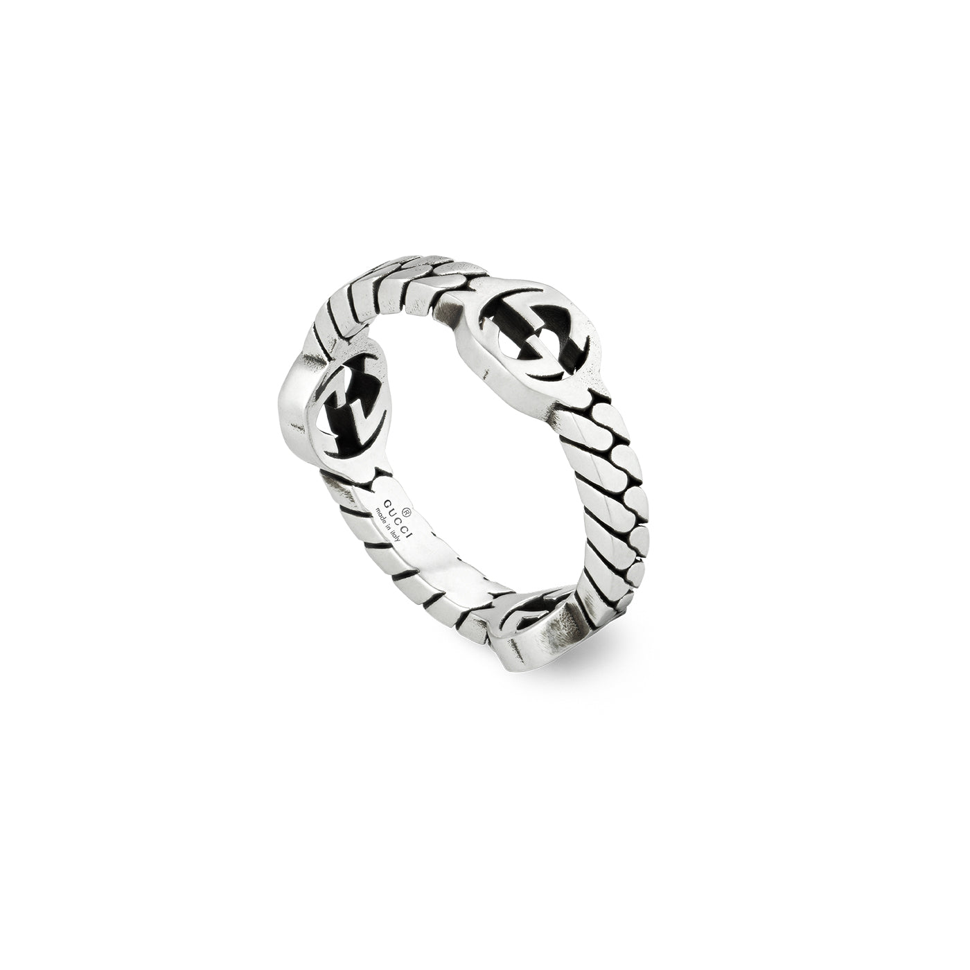 Sterling silver ring with an elegant twisted rope design and two round caps adorned with arrows pointing in opposite directions, featuring a polished finish reminiscent of the sophisticated Gucci Interlocking G Sterling Silver Ring from GUCCI Fine Jewellery.