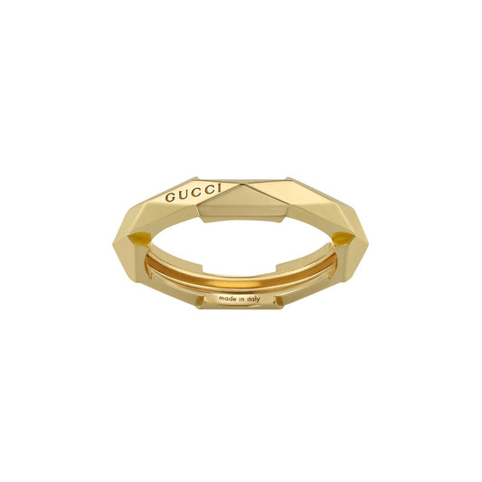 A Gucci Link to Love Studded 18K Yellow Gold Ring by GUCCI Fine Jewellery exudes luxury and modernity. Made in Italy, this piece showcases the brand name, creating a stunning statement accessory.