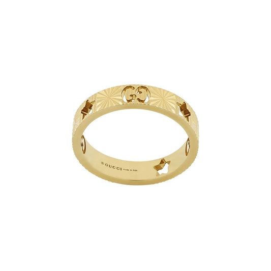 The Gucci Icon Star 18K Yellow Gold Ring from GUCCI Fine Jewellery features a striking star pattern alongside the signature GG motif. Its textured design, inspired by the Gucci Cosmogonie collection, adds an elegant touch.
