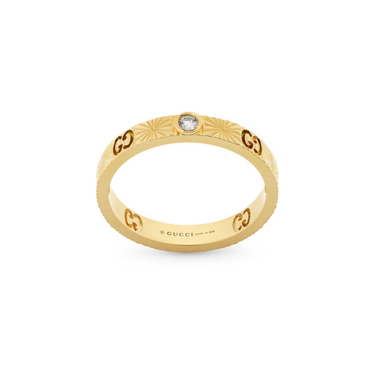 Indulge in the charm of the Gucci Icon Heart 18K Yellow Gold Diamond Ring by GUCCI Fine Jewellery, intricately designed with captivating patterns and the signature GG motif. A small, round diamond is elegantly set on top, making this piece exceptionally exquisite.