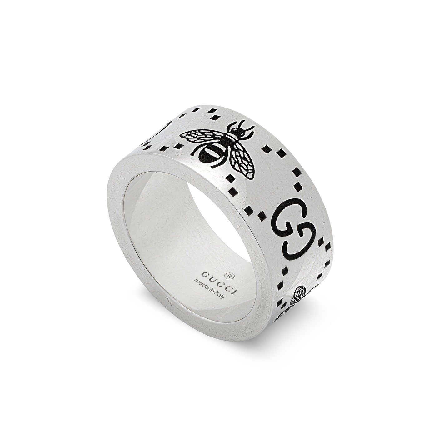 A Gucci GG and Bee engraved wide sterling silver ring from GUCCI Fine Jewellery, featuring a black bee and geometric designs that emphasize the iconic GG motif.