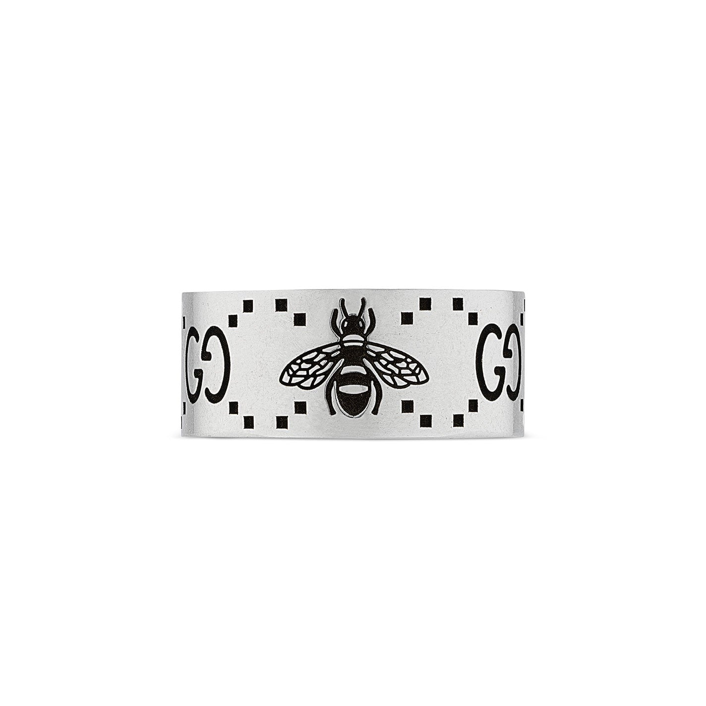 The Gucci GG And Bee Engraved Wide Sterling Silver Ring by GUCCI Fine Jewellery showcases a bee at the center, surrounded by the iconic "GG" motif on each side. The symmetrical and minimalist design embodies Gucci's signature style against a white background.