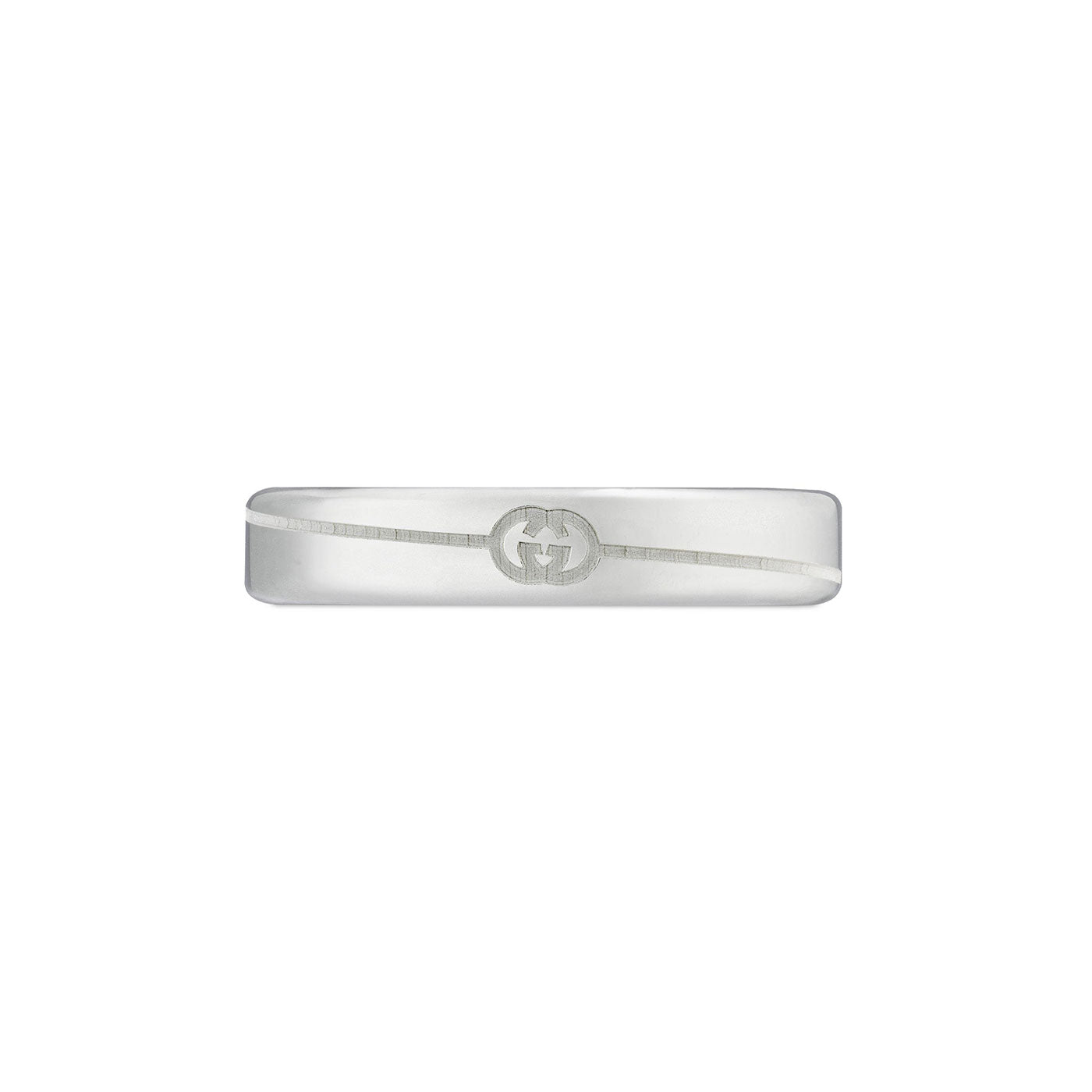 A sterling silver ring displaying Gucci's iconic diagonal interlocking G logo is placed on a plain white background, highlighting the refined design synonymous with GUCCI Fine Jewellery.