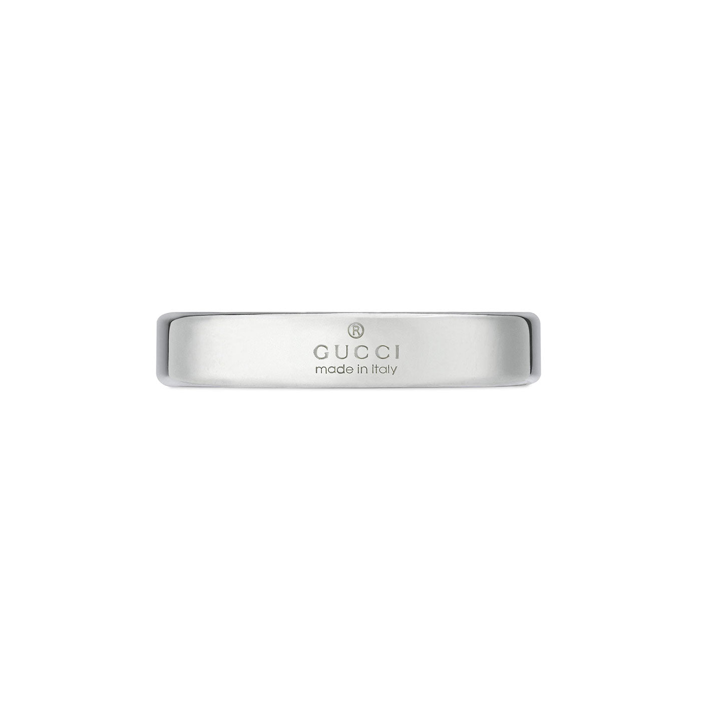 The Gucci Diagonal Interlocking G Sterling Silver Thin Ring by GUCCI Fine Jewellery showcases the iconic engraved "GUCCI made in Italy" on its smooth, polished band. With a subtle Interlocking G detail, this piece embodies elegance and craftsmanship.