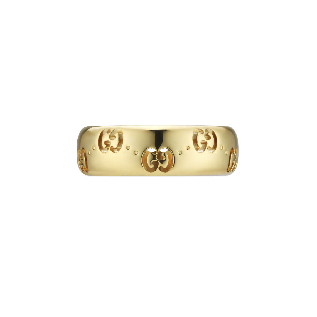 The Gucci Icon GG 18K Yellow Gold GG Thin Ring by GUCCI Fine Jewellery showcases engraved interlocking G logos and small decorative dots on its surface. With a smooth, polished finish, this piece exemplifies a simple yet elegant design.